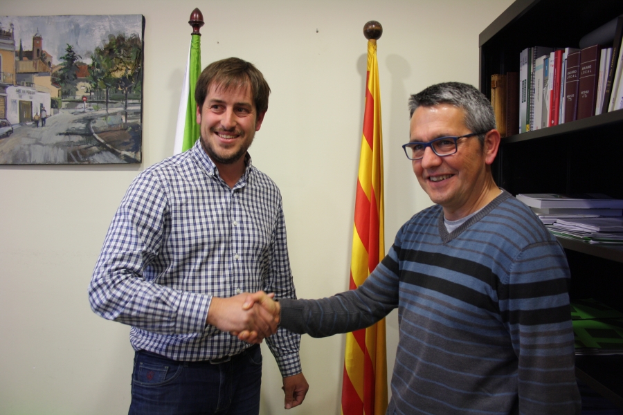 Francesc Bonet i Ramon Vilageliu durant la signatura de l'acord